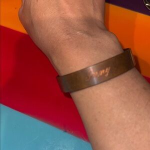 Copper bracelet that ‘Inny’ or ‘Jnny’ on it. Looks almost like Janny or Jinny.